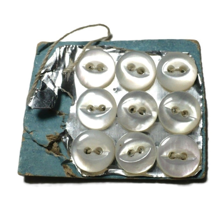 9L Two Hole Fish Eye Pearl Diminutive Buttons