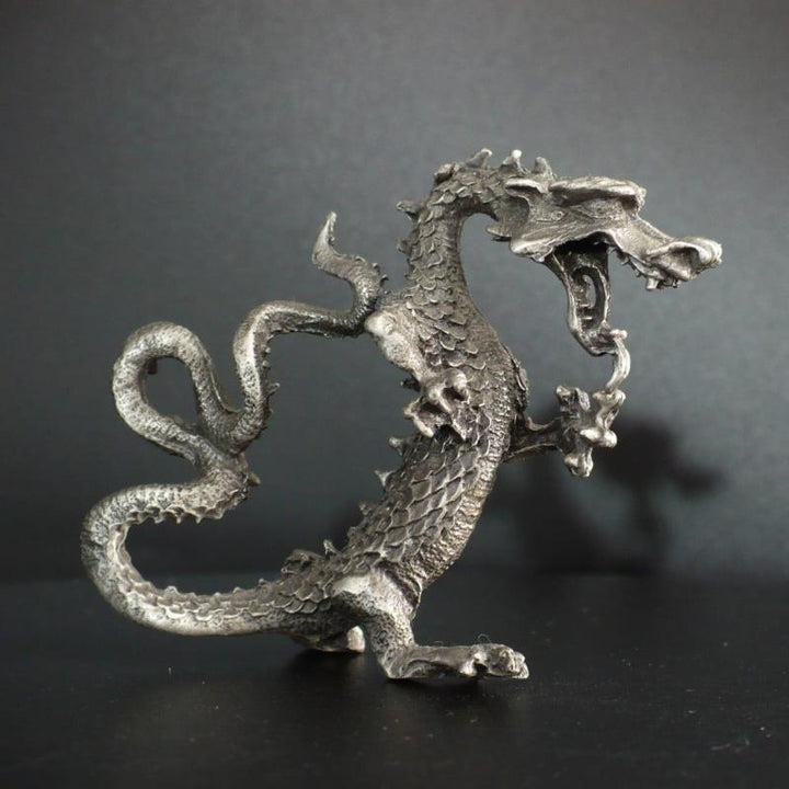 Pewter dragon.