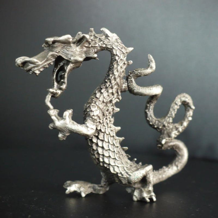 Pewter dragon.