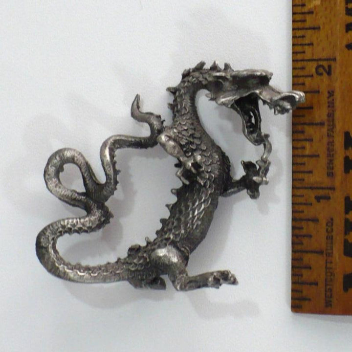 Pewter dragon.