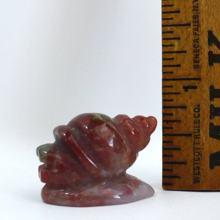 Carved Conch or Snail Figurine