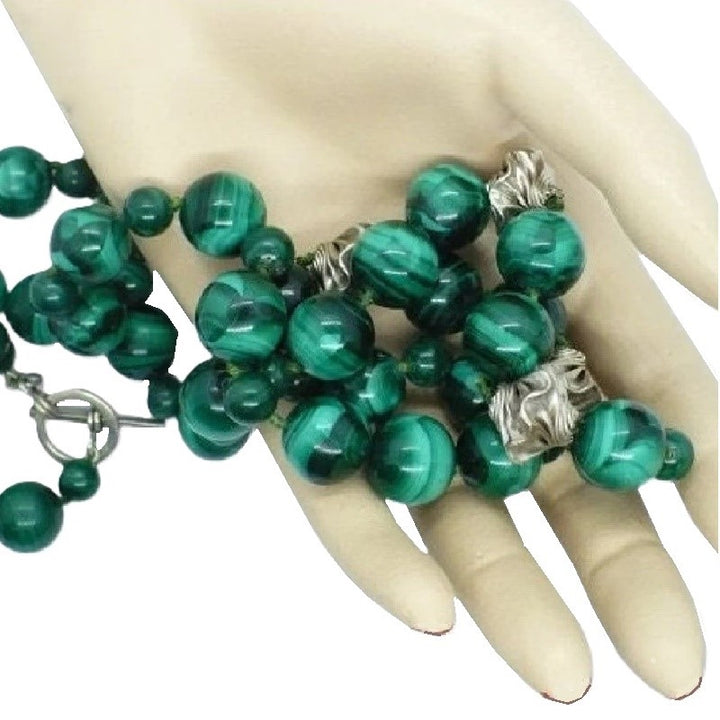 Malachite and silver necklace.