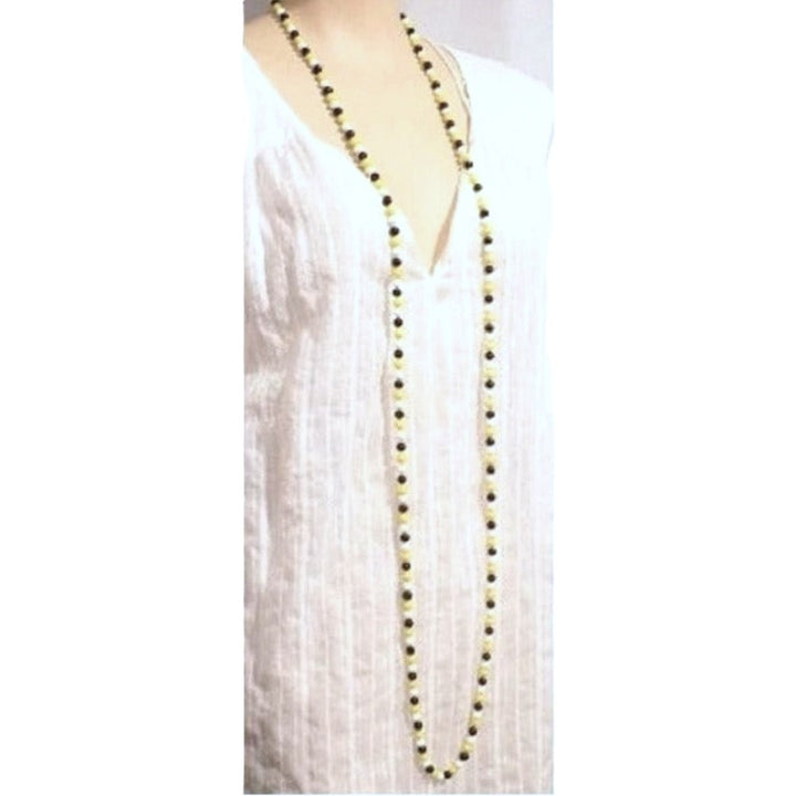 Necklace on mannequin showing length when worn.