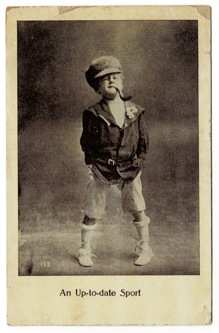 1909 Spunky Boy Hams It Up Postcard