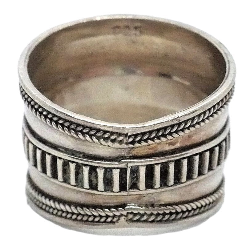 Ring view shows 925 hallmark indicating it is sterling silver. Shows jeweler's sizing seam at back of ring.