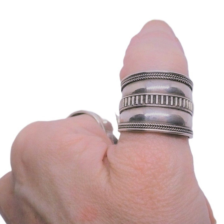 Displaying ring on a real person's thumb.